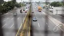 Penampakan Tol Jagorawi yang terlihat lenggang saat libur Kenaikan Isa Almasih, Jakarta, Kamis (14/5/2015). (Liputan6.com/Helmi Afandi)