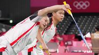 Pil pahit harus ditelan pasangan ganda campuran Indonesia, Praveen Jordan/Melati Daeva Oktavianti, usai langkahnya terhenti di babak perempat final Olimpiade Tokyo 2020. (Foto: AP/Dita Alangkara)