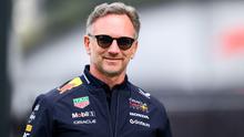 Kepala tim dan CEO Red Bull Racing asal Inggris, Christian Horner, tersenyum di sirkuit Red Bull Ring di Spielberg, Austria, pada 27 Juni 2025, menjelang Grand Prix Formula Satu Austria. (MAX SLOVENCIK/APA/AFP)