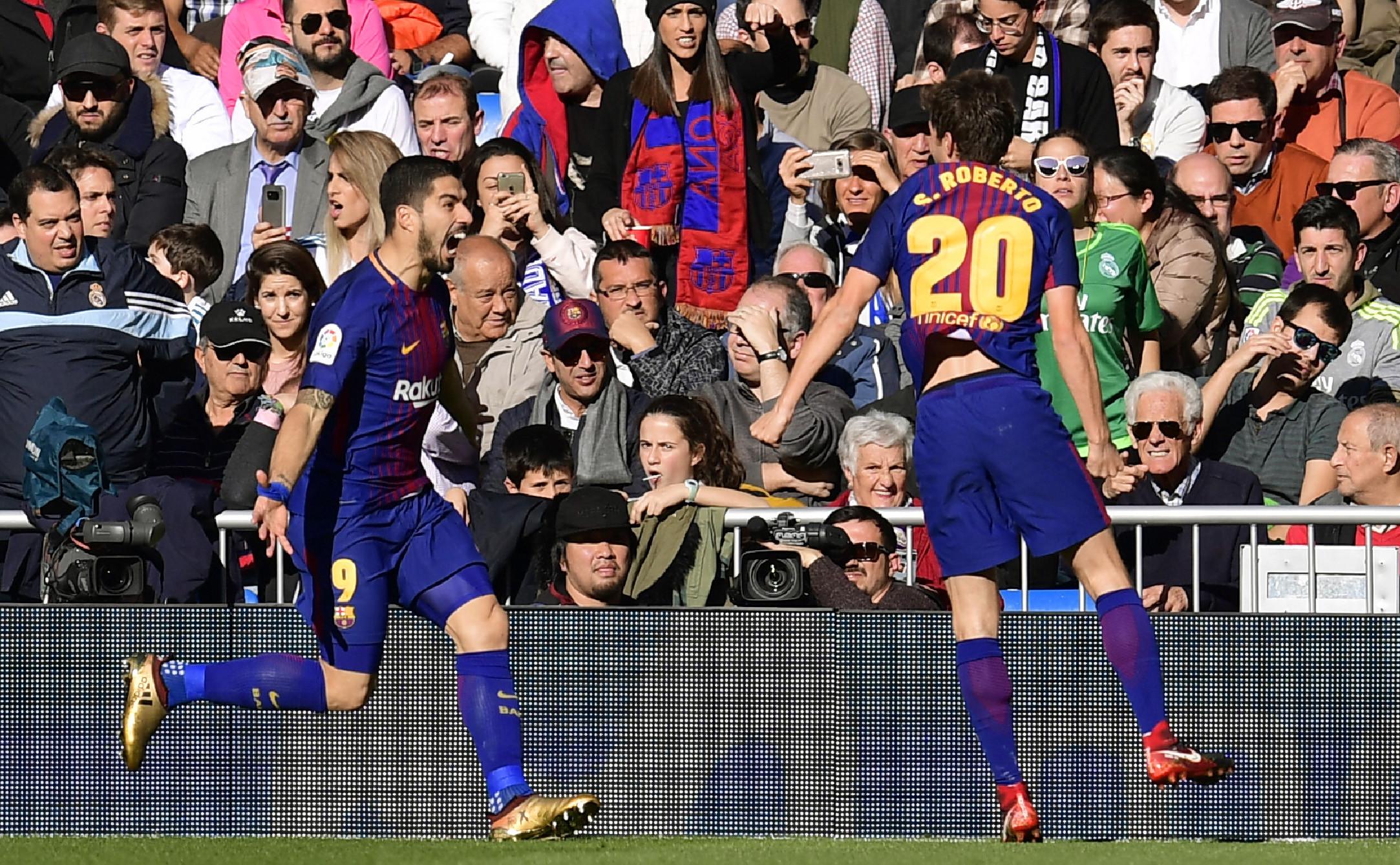 Luis Suarez rayakan gol ke gawang Real Madrid (JAVIER SORIANO / AFP)