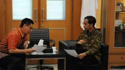 Melalui telekonferensi, Jokowi berdialog dengan perwakilan masyarakat adat Papua, Rabu (24/9/14). (Liputan6.com/Herman Zakharia)