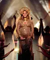 Hamil bukan penghalang bagi Beyonce Knowles untuk berkarya. Hadir di Grammy Awards 2017, tampilan Beyonce berhasil memukau para penonton yang hadir. Beberapa judul lagu dinyanyikan secara non-stop. (AFP/Bintang.com)