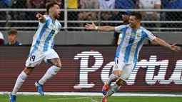 Argentina membuka keunggulan pada menit ke-13 melalui gol yang dicetak Nicolas Otamendi (kiri). (JUAN BARRETO/AFP)