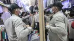 Pengunjung saat memilih pakaian impor bekas di Pasar Senen, Jakarta, Minggu (9/5/2021). Jelang Hari Raya Idul Fitri, bursa pakaian impor bekas masih diminati warga Ibu Kota untuk dikenakan saat Lebaran ataupun aktivitas sehari-hari. (merdeka.com/Iqbal S. Nugroho)