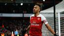 Perayaan gol Aubameyang pada laga lanjutan Premier League yang berlangsung di Stadion Emirates, London, Minggu (10/3). Arsenal menang 2-0 atas Man United. (AFP/Ian Kington)