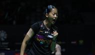 Tunggal putri andalan Indonesia, Putri Kusuma Wardani melakukan selebrasi usai mendapatkan poin pada pertandingan melawan wakil Taiwan, Sung Shuo Yun dalam babak 32 besar Indonesia Masters 2026 di Istora Senayan, Jakarta pada Rabu (21/01/2026). (Bola.com/Abdul Aziz)