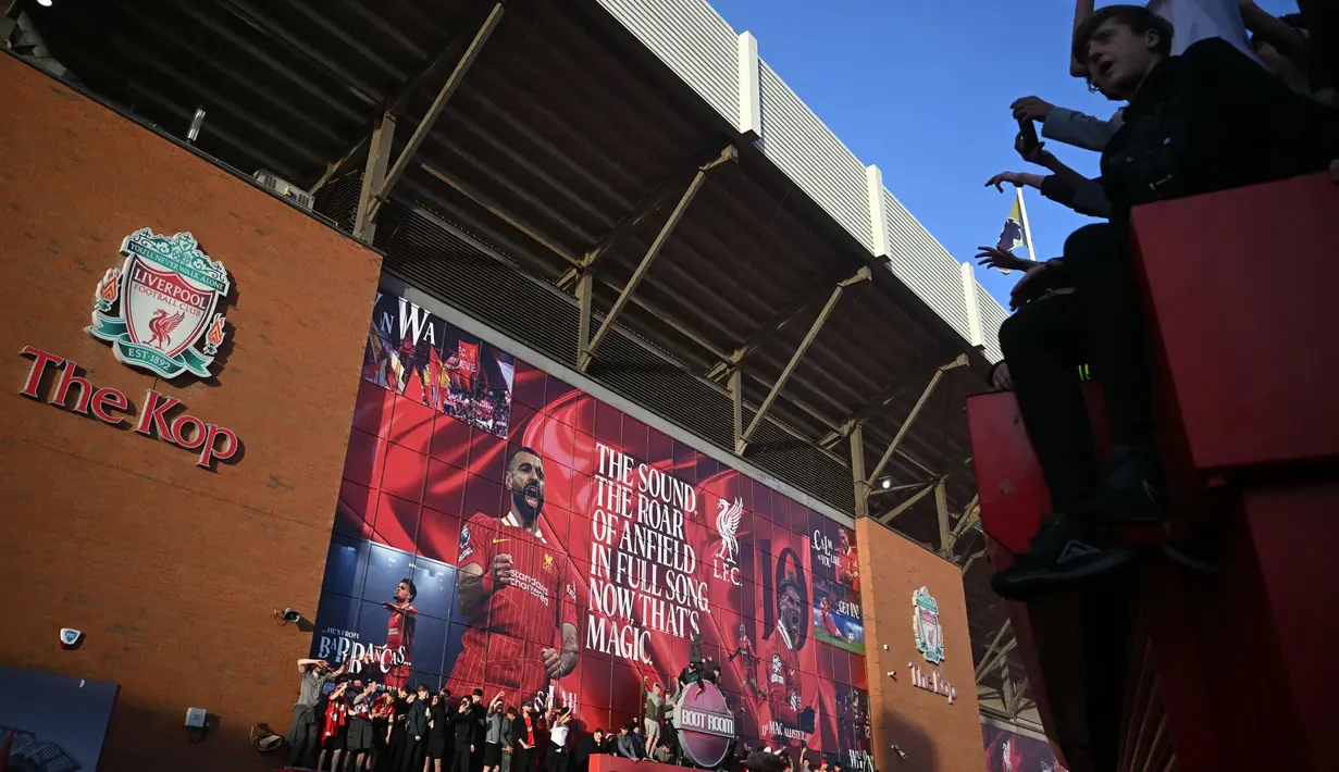 Torehan Liverpool ini sekaligus menyamai Manchester United sebagai tim dengan gelar juara terbanyak di kasta tertinggi Liga Inggris. (Paul ELLIS/AFP)