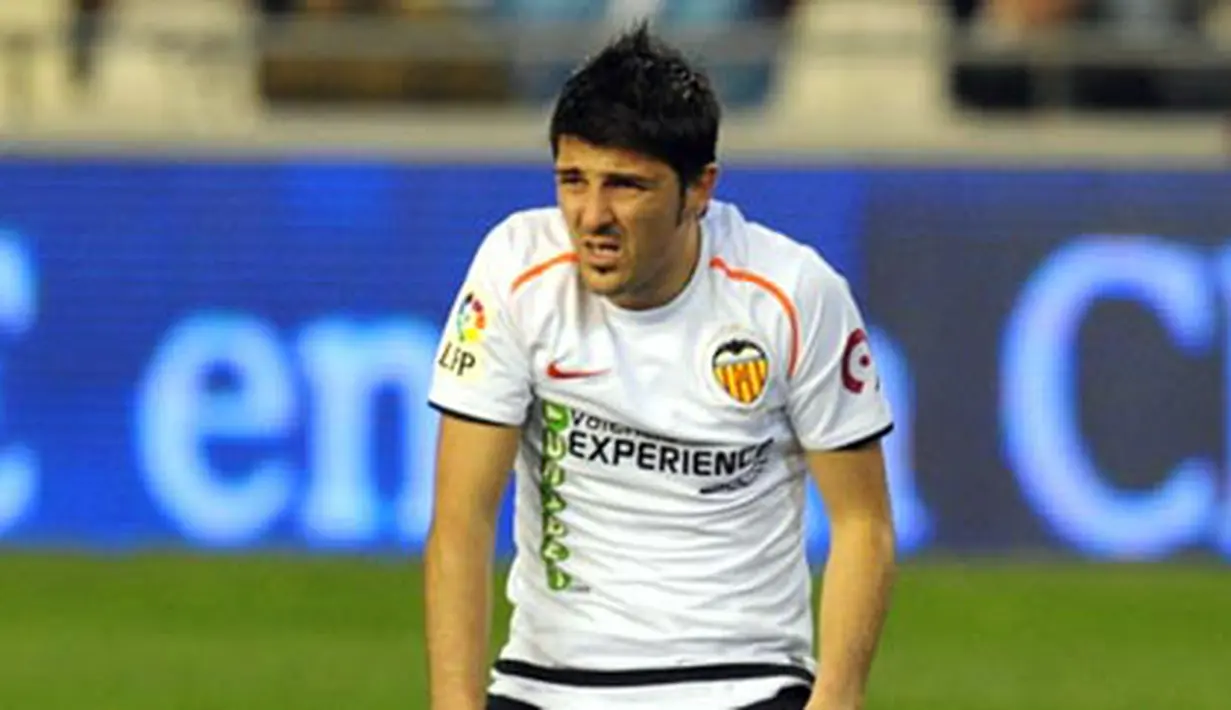 Valencia's David Villa reacts during theIR Spanish league football match against Malaga at the Mestalla Stadium in Valencia, on February 14, 2009. AFP PHOTO/DIEGO TUSON
