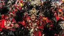 Penari menampilkan tarian khas Indonesia saat car free day (CFD) di Jalan Sudirman, Jakarta, Minggu (4/8/2019). Acara yang bertujuan untuk merekatkan masyarakat ini digagas Belantara Budaya Indonesia dengan mengampanyekan slogan 'Tunjukkan Indonesiamu'. (Liputa6.com/JohanTallo)