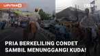 Beredar sebuah video yang memancing rasa heran di media sosial. Tampak seorang pria tunggangi kudanya untuk mengelilingi Condet, Jakarta Timur