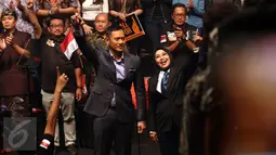 Calon Gubernur Agus Harimurti Yudhoyono bersama Calon Wakil Gubernur Sylvi saat hadir di acara pidato politiknya di Jakarta, Minggu (27/11). (Liputan6.com/Johan Tallo)