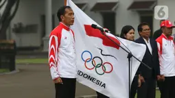 Presiden Joko Widodo atau Jokowi saat upacara pelepasan Kontingen Indonesia untuk SEA Games 2019 Filipina di Istana Bogor, Jawa Barat, Rabu (27/11/2019). Sebanyak 841 atlet Indonesia akan bertanding pada SEA Games Filipina di 51 cabang olahraga. (Liputan6.com/Angga Yuniar)