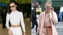 Crop top dan sweat pants kayaknya cocok banget ya dipakai oleh kakak beradik Gigi dan Bella Hadid. (MARC PIASECKI/GC IMAGES; BROADIMAGE/REX/SHUTTERSTOCK/InStyle)