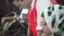 Assyifa Ramadhani dan Ahmad Imam Al Hafitd saat menghadiri sidang di PN Jakpus, Selasa (26/8/2014) (Liputan6.com/Faizal Fanani)