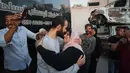 Pembebasan dilakukan dalam dua kelompok, dengan kelompok pertama dibebaskan dari penjara Ofer di Tepi Barat dan kelompok kedua dibebaskan dari penjara Ketziot di Israel bagian selatan. (AP Photo/Abdel Kareem Hana)
