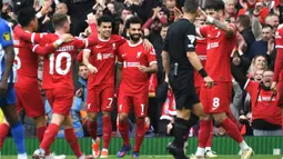 Liverpool sukses membalik keadaan dan unggul 2-1 atas Brighton. (AP Photo/Rui Vieira)