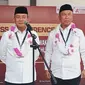 Paslon Andi Ibrahim Masdar dan Asnuddin Sokong (AIM-PAS) mendaftar di KPU Sulbar (Liputan6.com/Abdul Rajab Umar)