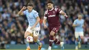 Man City mengoleksi 79 poin dari 33 laga, sedangkan Arsenal tertinggal satu poin meski sudah memainkan 34 laga. (AP Photo/Dave Thompson)