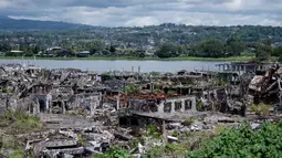 Pemandangan kehancuran bangunan-bangunan di Kota Marawi, Provinsi Lanao del Sur, Filipina, Kamis (23/5/2019). Rumah, masjid, gereja, dan bangunan lainnya hancur porak poranda dalam pertempuran antara pasukan pemerintah dengan militan ISIS yang berlangsung selama lima bulan. (Noel CELIS/AFP)
