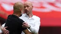 Manajer Manchester United Erik ten Hag berbicara dengan Manajer Manchester City Pep Guardiola setelah pertandingan final Piala FA di Stadion Wembley, London, Inggris, Sabtu (3/6/2023). MU kalah 1-2 dari Man City. (Adrian DENNIS / AFP)