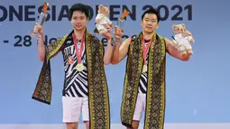 Gelar di Indonesia Open 2021 merupakan gelar ketiga berurutan bagi Marcus Gideon/Kevin Sanjaya. Dua Gelar sebelumnya diraih pada edisi 2018 dan 2019. Pada Edisi 2020 Turnamen Bulu Tangkis Indonesia Open dibatalkan akibat wabah Pandemi COVID-19. (Dok. PBSI)