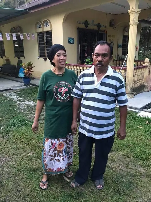 Abu Zarin dan istri