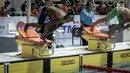 Perenang Indonesia  Triady Fauzi Sidiq tampil di nomor 100 meter gaya bebas SEA Games 2017 di National Aquatic Centre, Malaysia, (23/8). Triady Fauzi Sidiq berhasil membawa medali perak dalam kategori 100 Meter gaya bebas. (Liputan6.com/Faizal Fanani)
