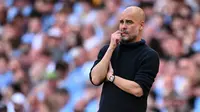 Salah satu target idaman FA untuk menggantikan Gareth Southgate tidak lain adalah Pep Guardiola. Pep sudah dipastikan tidak akan memperpanjang kontraknya di City yang habis di tahun 2025 mendatang. Itulah mengapa FA akan mencoba merayu Pep untuk mau menangani Timnas Inggris. (Oli SCARFF / AFP)