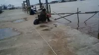 Pelindung Istimewa Pemancing Ikan Pinggir Sungai Kapuas