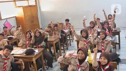 Mahkamah Konstitusi (MK) mengabulkan sebagian gugatan terhadap Pasal 34 ayat (2) Undang-Undang Nomor 20 Tahun 2003 tentang Sistem Pendidikan Nasional (Sisdiknas). (Liputan6.com/Angga Yuniar)