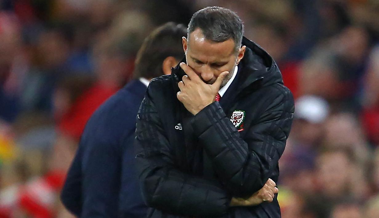 Kasus tersebut pun turut mempengaruhi karier kepelatihan Giggs. Asosiasi Sepak Bola Wales mengumumkan Robert Page akan menggantikan Ryan Giggs di Timnas Wales. (Foto: AFP/Geoff Caddick)