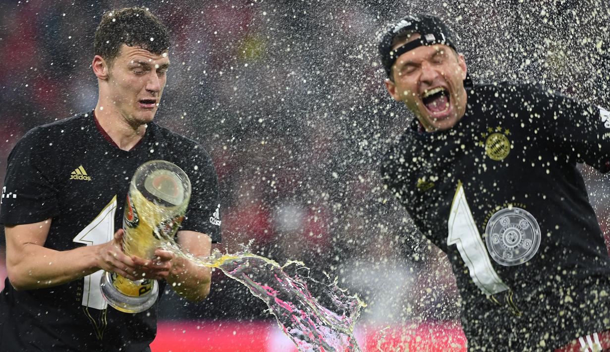 <p>Bayern, dengan 10 gelar juara beruntun, memecahkan rekor baru di lima liga top Eropa. Bayern adalah tim yang mampu mempertahankan gelar juara paling lama. (AFP/Christof Stache)</p>