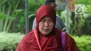 Panitera Pengganti PN Tangerang Tuti Atika berjalan menuju ruang pemeriksaan di gedung KPK, Jakarta, Selasa (24/4). Tuti Atika diperiksa terkait kasus suap penangan perkara di Pengadilan Negeri Klas I A Khusus Tangerang. (Merdeka.com/Dwi Narwoko)