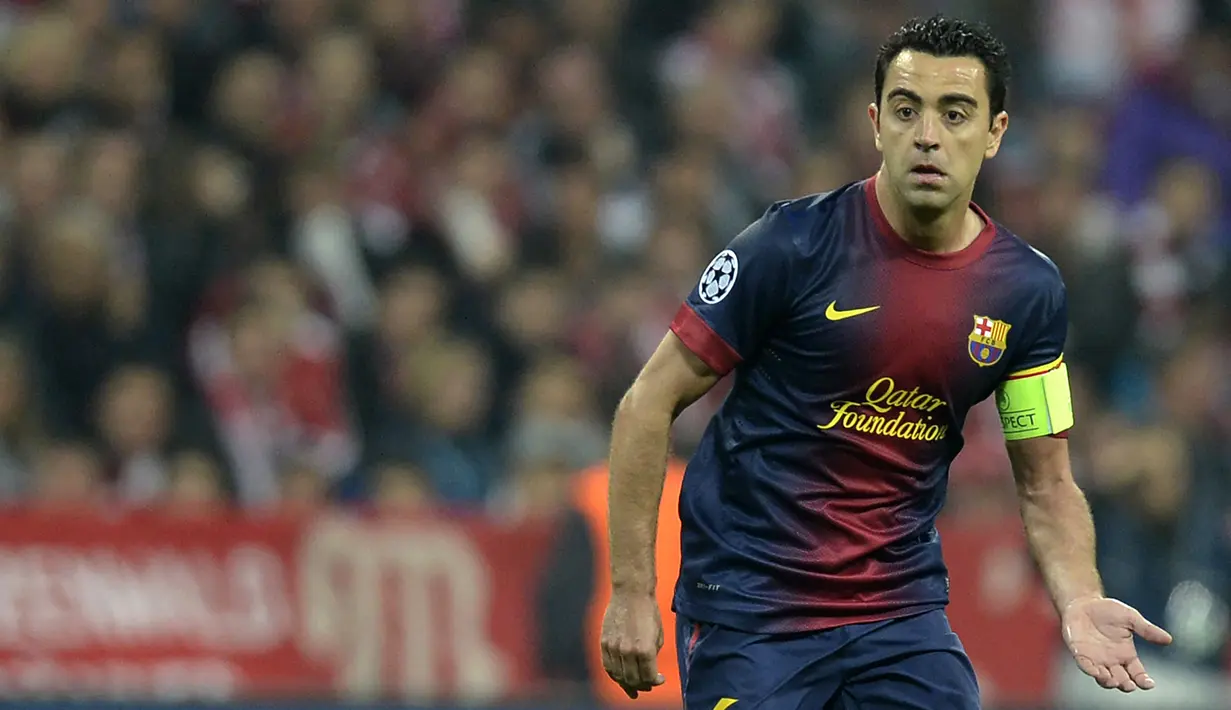 2. Xavi Hernandez - Xavi merupakan salah satu gelandang terbaik yang pernah dimiliki Barcelona. Ia merasakan trebele winner saat membawa Barcelona meraih juara Liga Champions, Spanish Champion, Spanish Cup pada 2009 dan 2015. (AFP/Christof Stache)