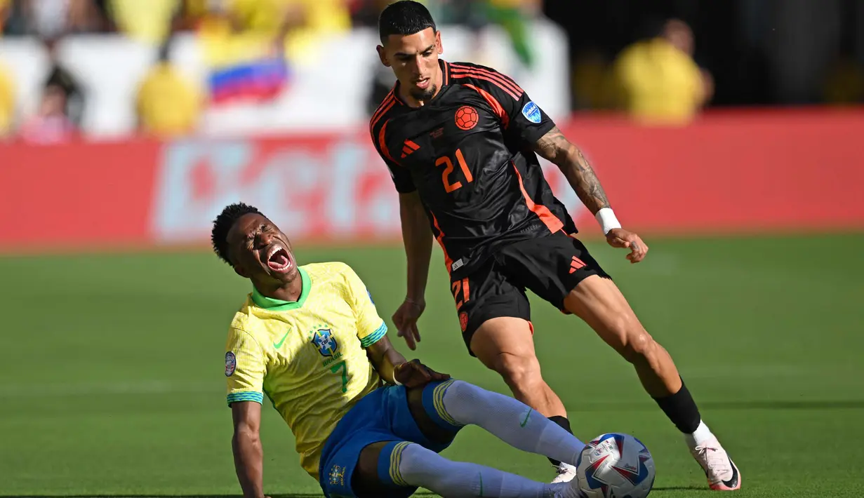Hingga peluit akhir pertandingan dibunyikan, tidak ada lagi gol yang tercipta. Laga antara Brasil melawan Kolombia berakhir imbang 1-1. (Patrick T. Fallon/AFP)