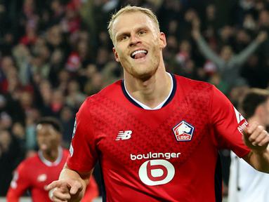 Pemain LOSC Lille, Mitchel Bakker melakukan selebrasi setelah mencetak gol ke gawang Sturm Graz pada laga Liga Champions yang berlangsung di Pierre-Mauroy Stadium, Villeneuve d'Ascq, Prancis, 11 Desember 2024. (AFP/Denis Charlet)