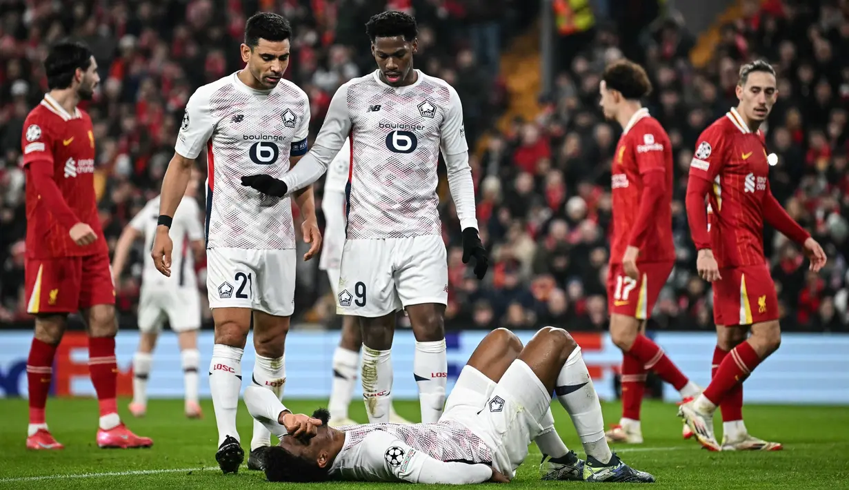 Sementara, Lille LOSC yang kalah dari Liverpool harus turun ke peringkat 11 dengan poin 13. (Paul ELLIS/AFP)