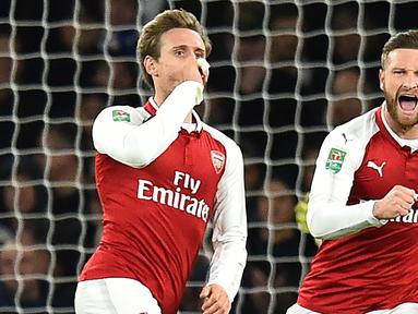 Arsenal termasuk klub yang tidak bisa dilepaskan dengan Liga Spanyol. Banyak pemain yang memilih melanjutkan karier di Liga Spanyol usai memperkuat The Gunners. Seperti 5 pemain berikut, kecuali Francis Coquelin, yang awalnya memang didatangkan dari Liga Spanyol. (AFP/Glyn Kirk)
