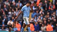 Gelandang Manchester City Rodri bereaksi meninggalkan lapangan setelah mendapat kartu merah dalam pertandingan Liga Inggris melawan&nbsp;Nottingham Forest di Etihad Stadium, Manchester, Sabtu, 23 September 2023. (Oli SCARFF / AFP)