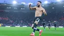 Pemain Liverpool, Mohamed Salah, melakukan selebrasi setelah mencetak gol ke gawang Southampton pada laga Liga Inggris pekan ke-12 di St Mary’s Stadium, Minggu (24/11/2024) malam WIB. (AP Photo/Sean Ryan)