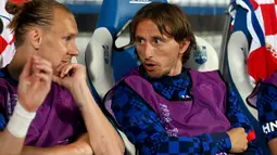 Tuan rumah Kroasia tampil timpang di awal laga tanpa diperkuat andalannya, Luka Modric yang sempat dicadangkan. (AFP/Denis Lovrovic)