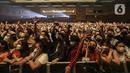 Pengunjung menghadiri BNI Java Jazz Festival 2022 hari kedua di JIExpo Kemayoran, Jakarta, Sabtu (28/5/2022). Perhelatan musik BNI Java Jazz Festival 2022 digelar pada 27-29 Mei dengan menampilkan musisi-musisi dari dalam dan luar negeri. (Liputan6.com/Johan Tallo)