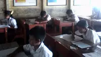 Pelaksanaan ujian nasional ( UN ) tingkat sekolah dasar yang di dilaksanakan serempak 