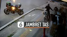 Terekam kamera CCTV, seorang pengendara motor jambret sebuah tas milik seorang turis. Peristiwa terjadi saat turis tengah menikmati kopinya di sebuah kafe di Udon Thani, Thailand.