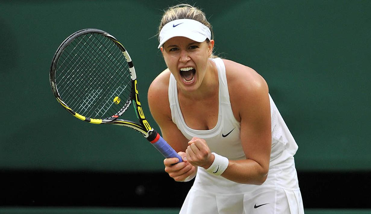 Eugenie Bouchard memiliki tinggi 178 cm dengan berat 61 kg. Dirinya biasa bermain dengan mengandalkan tangan kanannya. (AFP/Glyn Kirk)