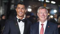 Cristiano Ronaldo dan Sir Alex Ferguson. (AFP/Jack Taylor)