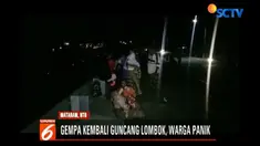 Jalanan dipenuhi kendaraan yang hendak menuju ke arah dataran yang lebih tinggi karena gempa dikabarkan berpotensi tsunami.