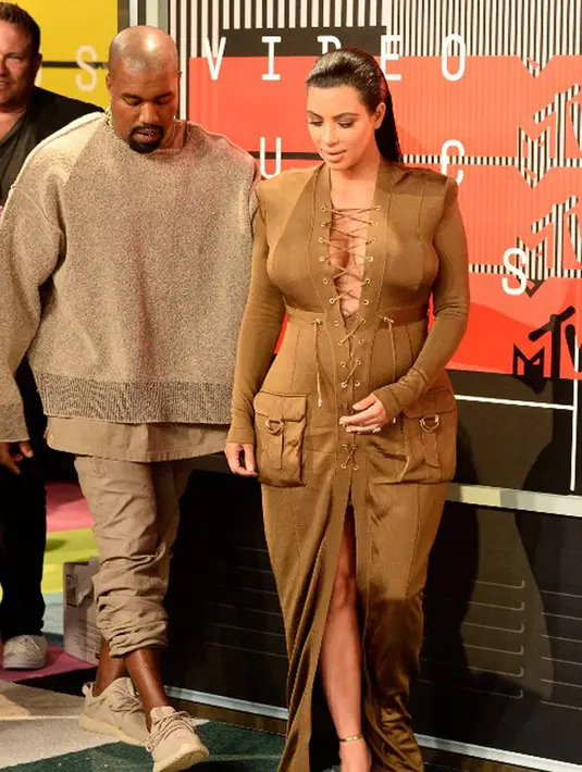 Selain itu Kanye West memiliki rencana untuk berlibur bersama Kim Kardashian dan anak-anaknya. Kabarnya Kanye tak ingat terakhir kali dirinya berlibur bersama dengan keluarga. (AFP/Bintang.com)