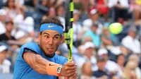 Rafael Nadal, lolos ke babak ketiga turnamen tenis Wimbledon 2017 setelah tahun lalu absen akibat mengalami cedera. (EPA/Andrew Gombret)