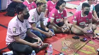 Sebanyak 2.160 pemain game (gamer) sepakbola FIFA se-Indonesia beradu taktik dalam turnamen Super Esport Series KITA Super 2022. (Dian Kurniawan/Liputan6.com)
